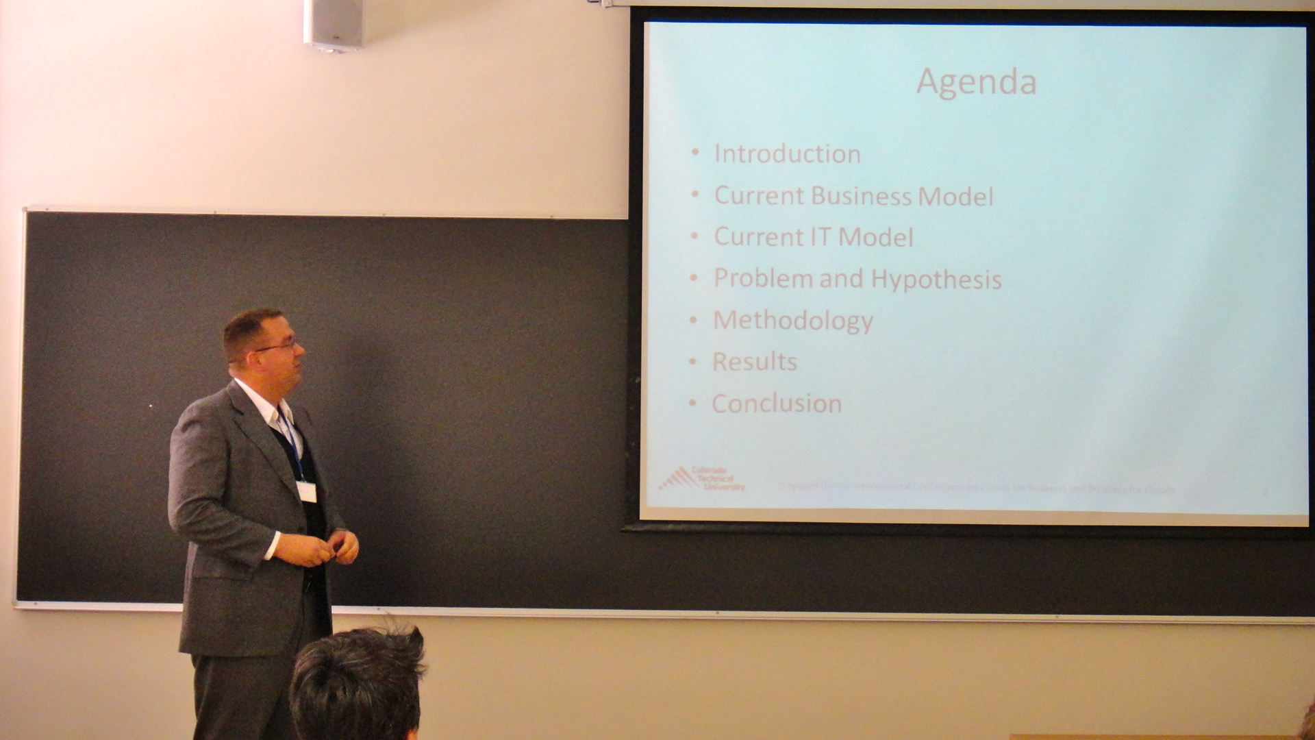 A Holistic Model for Making Cloud Migration Decision: A Consideration of Security, Architecture and Business Economics
